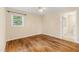 Bedroom with hardwood floors and natural light at 2015 Walnut St, Durham, NC 27705
