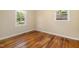 Bedroom with hardwood floors, natural light, and neutral walls at 2015 Walnut St, Durham, NC 27705