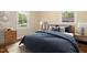 Comfortable bedroom with natural light, stylish furnishings, and a peaceful ambiance at 2015 Walnut St, Durham, NC 27705