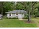 Charming single-story home with a well-manicured front yard at 2015 Walnut St, Durham, NC 27705