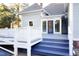 Outdoor entertaining deck with stairs, ramp and multiple access points at 208 Glenn St, Franklinton, NC 27525