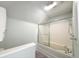 Bathroom features a tiled shower with glass doors and a neutral color scheme at 208 Glenn St, Franklinton, NC 27525