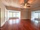 Spacious bedroom with hardwood floors, a wood-paneled ceiling, and large windows at 208 Glenn St, Franklinton, NC 27525