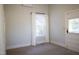Bright bedroom featuring a window with white curtains and an air conditioning unit at 208 Glenn St, Franklinton, NC 27525