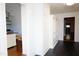 Entryway with a built-in bookshelf and wainscoting detail at 208 Glenn St, Franklinton, NC 27525