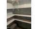 Well-organized pantry with patterned shelf liners, providing ample storage space at 208 Glenn St, Franklinton, NC 27525
