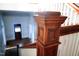 Classic staircase with wooden post and white banister, offering a traditional design element at 208 Glenn St, Franklinton, NC 27525