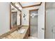 Charming bathroom with a wood-framed mirror and granite countertop at 2300 Valley Forge Dr, Raleigh, NC 27615