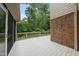 Exterior deck overlooks backyard with mature trees at 2300 Valley Forge Dr, Raleigh, NC 27615