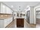 Spacious kitchen with stainless steel appliances and center island at 2300 Valley Forge Dr, Raleigh, NC 27615