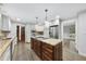 Eat in kitchen with stainless steel appliances and island at 2300 Valley Forge Dr, Raleigh, NC 27615