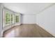 Large living room features hardwood floors, shutters and bright light at 2300 Valley Forge Dr, Raleigh, NC 27615