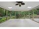 Screened-in porch with skylights and a ceiling fan at 2300 Valley Forge Dr, Raleigh, NC 27615
