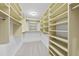 Organized walk-in closet with custom shelving and ample storage space at 2300 Valley Forge Dr, Raleigh, NC 27615