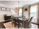 Elegant dining room featuring stylish decor, wood floors, and ample seating at 2303 Byrd St, Raleigh, NC 27608