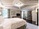 Spacious main bedroom features a decorative tray ceiling, area rug, and natural lighting at 2303 Byrd St, Raleigh, NC 27608