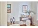 Dining room featuring hardwood floors, curated art, and stylish furniture at 2418 Highland Ave, Durham, NC 27704