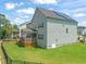Large, fenced backyard with a deck and screened-in porch, ideal for outdoor enjoyment at 2636 Nordmann Fir Rd, Raleigh, NC 27616
