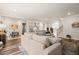 Spacious living room with an open floor plan, seamless transition to the kitchen and dining area at 2636 Nordmann Fir Rd, Raleigh, NC 27616