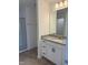 Bathroom featuring granite countertop vanity and a glass-enclosed shower at 269 Hank Way, Angier, NC 27501