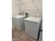 Laundry room equipped with a white washer and dryer at 269 Hank Way, Angier, NC 27501