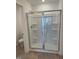 Modern bathroom with a large glass-enclosed shower and a white toilet at 269 Hank Way, Angier, NC 27501