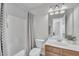Clean bathroom featuring a single sink, toilet, and shower with curtain at 2744 Laurelcherry St, Raleigh, NC 27612