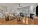Inviting living room with hardwood floors, fireplace, and a comfortable seating area at 2744 Laurelcherry St, Raleigh, NC 27612