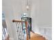 Elegant staircase with wood treads and metal balusters leads to the upper level at 2744 Laurelcherry St, Raleigh, NC 27612