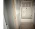 A new bathroom with a shower and tub combo with white fixtures, awaiting final finishes at 2744 Rains Mill Rd, Princeton, NC 27569