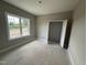 A bedroom under construction with large windows and natural light at 2744 Rains Mill Rd, Princeton, NC 27569