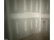 Close up image of drywall in hallway ready for paint and interior finishing at 2744 Rains Mill Rd, Princeton, NC 27569