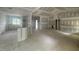 Bright and airy living space with large windows, and an open layout ready for finishing touches at 2744 Rains Mill Rd, Princeton, NC 27569