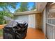 Outdoor porch with a grill, providing the perfect space for backyard cooking at 2805 Friendship Rd, Durham, NC 27705