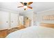 Spacious bedroom with hardwood floors, multiple closets, and neutral wall colors at 2805 Friendship Rd, Durham, NC 27705