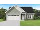 Charming single-Gathering home with a two-car garage and manicured front lawn at 2816 Ricolden Trl, Elon, NC 27244