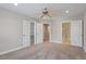 Spacious bedroom with ample closet space and access to an ensuite bathroom at 2822 Pickett Rd # 132, Durham, NC 27705