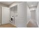 Convenient laundry room closet with white washer and dryer, providing ease and functionality at 2822 Pickett Rd # 132, Durham, NC 27705
