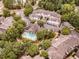 Aerial view of a beautiful community with lush greenery and a sparkling pool at 301 Presque Isle Ln, Chapel Hill, NC 27514