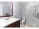 Bathroom featuring a glass enclosed shower, modern fixtures and vanity with sink at 301 Presque Isle Ln, Chapel Hill, NC 27514