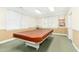 Game room featuring a classic billiards table and bright windows at 301 Presque Isle Ln, Chapel Hill, NC 27514
