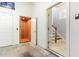 Garage with elevator and staircase access to the main floor, offering convenience and accessibility at 301 Presque Isle Ln, Chapel Hill, NC 27514