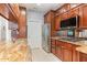 Well-appointed kitchen featuring stainless steel appliances and granite countertops at 301 Presque Isle Ln, Chapel Hill, NC 27514
