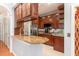 Kitchen featuring granite countertops, stainless steel appliances, and wooden cabinets at 301 Presque Isle Ln, Chapel Hill, NC 27514