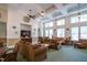 Spacious living room with comfortable seating, stylish decor, and ample natural light at 301 Presque Isle Ln, Chapel Hill, NC 27514