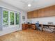 Office with natural light, hardwood floors, a ceiling fan, and built-in storage at 310 Heidinger Dr, Cary, NC 27511