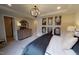 This is a bedroom with carpet, wooden furniture, and a chandelier at 3225 Pelican Ln, Durham, NC 27703