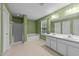 Bright bathroom with soaking tub, step-in shower, and double sink vanity at 3705 Rivermist Dr, Raleigh, NC 27610