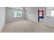 Bedroom featuring neutral walls, carpet flooring, a ceiling fan, and natural light at 3705 Rivermist Dr, Raleigh, NC 27610