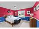 Inviting bedroom with hardwood floors and a large window at 3705 Rivermist Dr, Raleigh, NC 27610